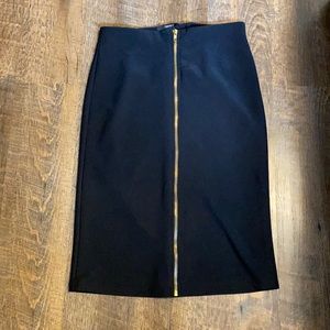 Skirt, black and gold zipper, good condition, too big never worn.